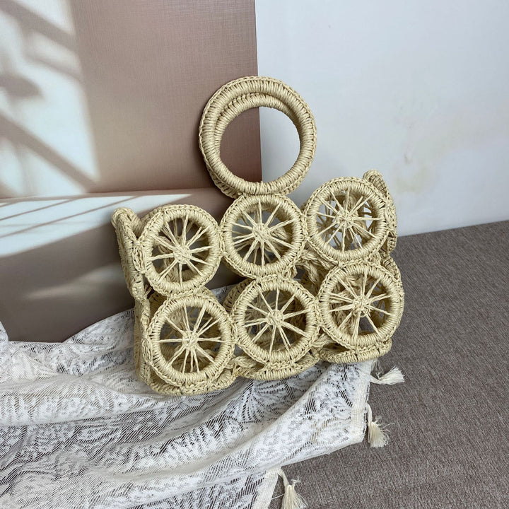Artisan woven basket bag with striking wheel pattern Bowlift