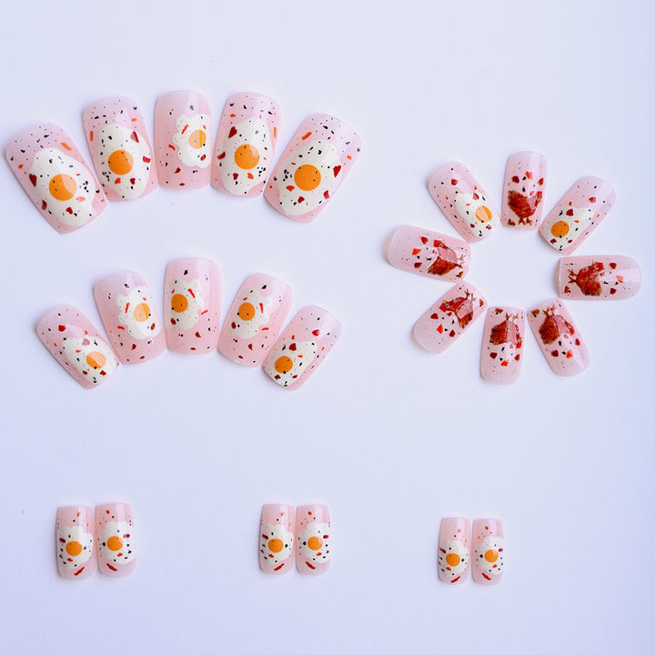 Artificial nails with playful breakfast motif Bowlift