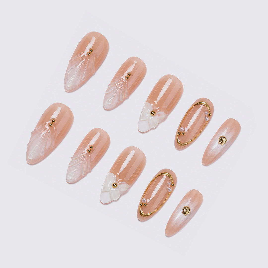 Acrylic nail set with floral and elegant embellishments Bowlift