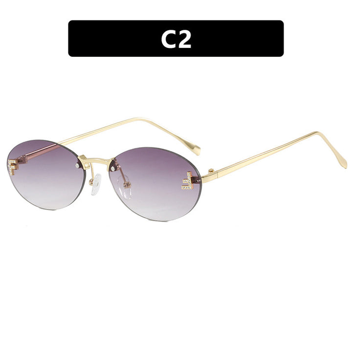Women's fashionable sunglasses with elegant, round lenses and delicate metal frame Bowlift