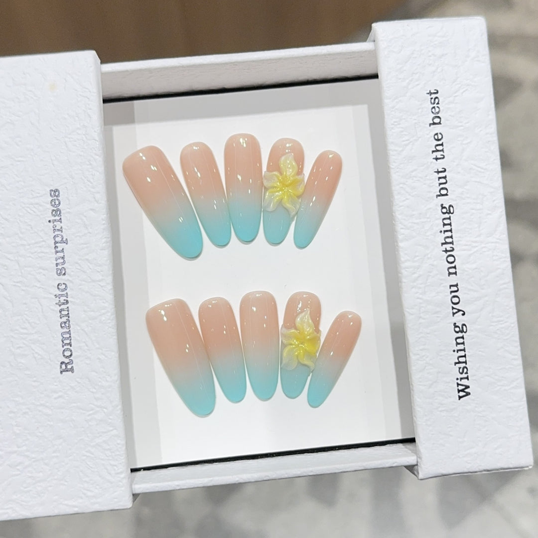 Artificial nails with enchanting ombre effect and floral accents Bowlift
