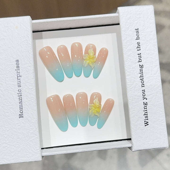 Artificial nails with enchanting ombre effect and floral accents Bowlift