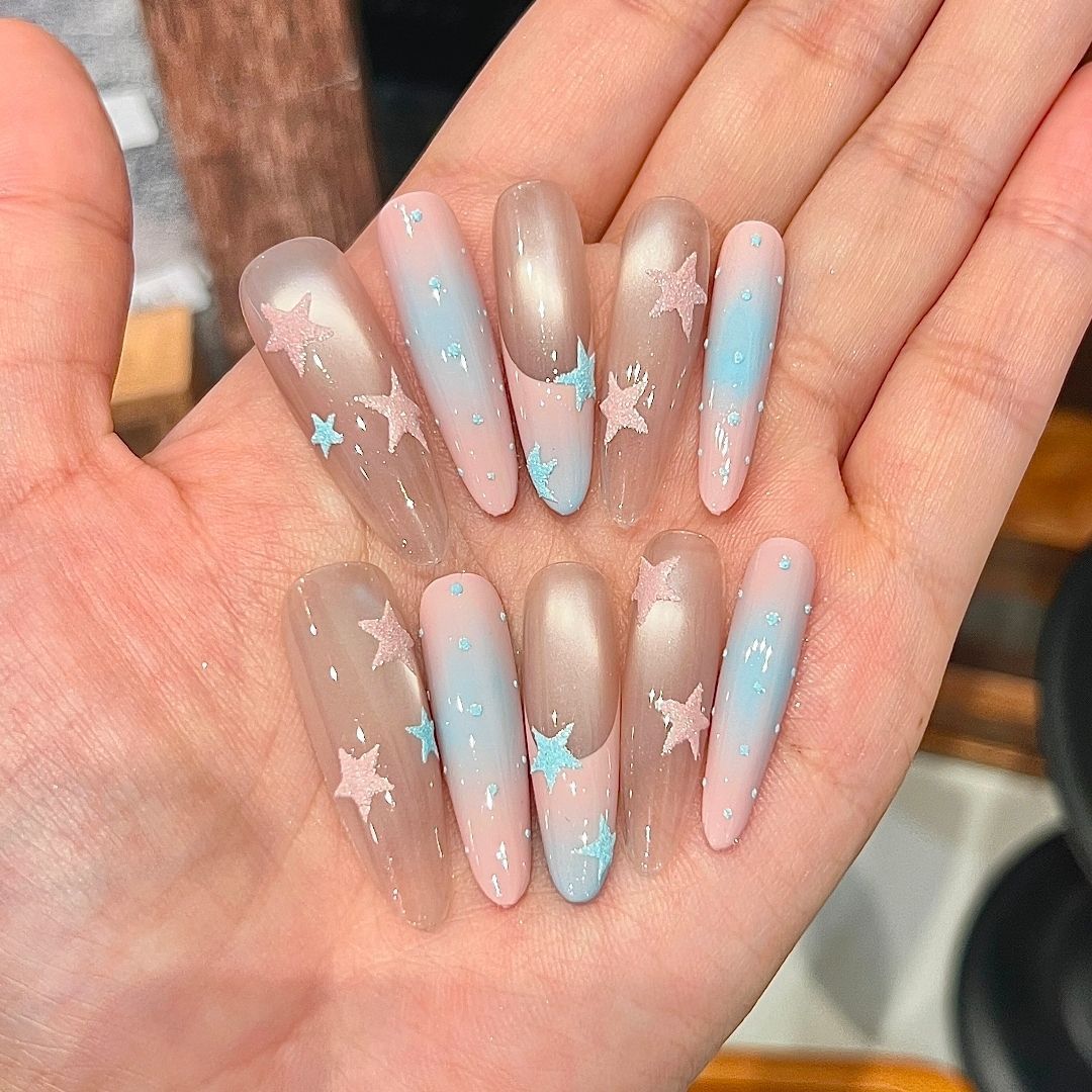 Artistic Long Stiletto Nail Enhancements Bowlift