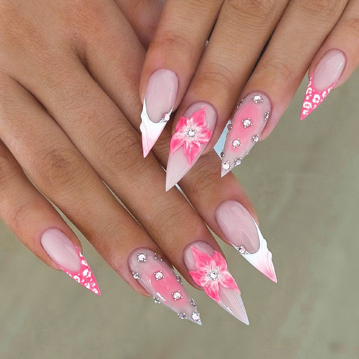 Nail art set with elegant floral embellishments and glamorous accents Bowlift