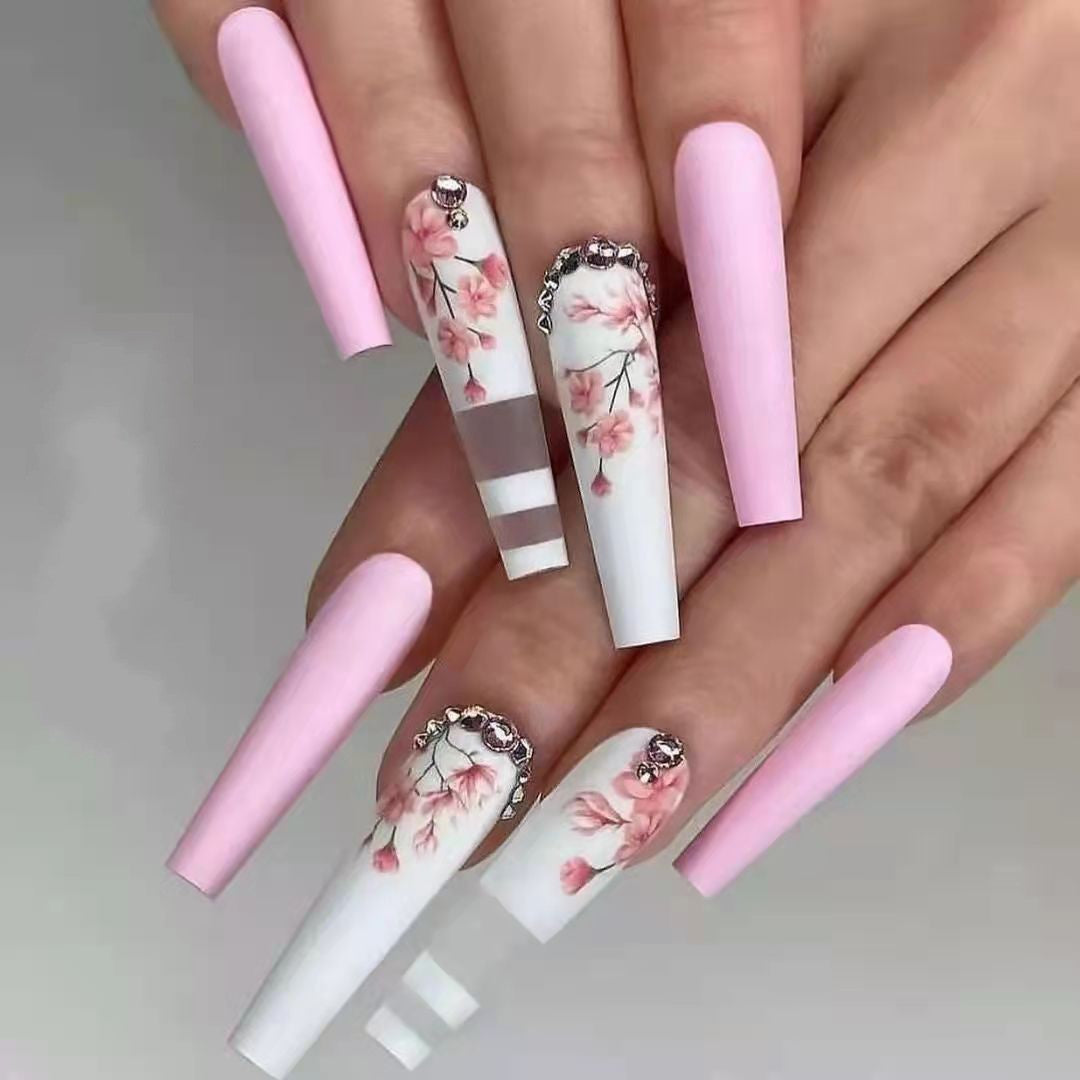 Artificial nails with floral embellishments Bowlift