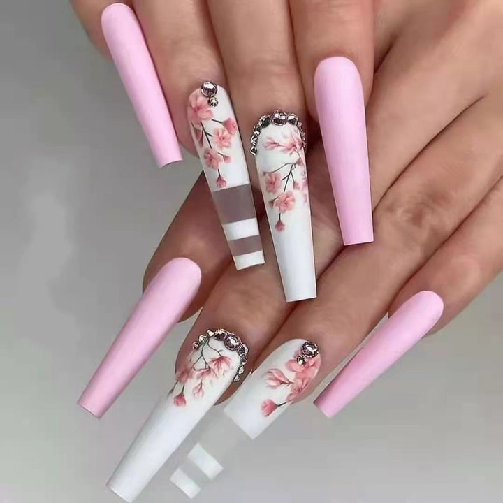 Artificial nails with floral embellishments Bowlift