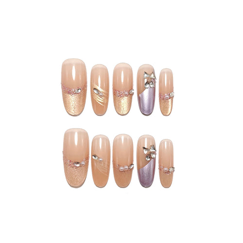 Glamorous artificial nails with rhinestone applications Bowlift