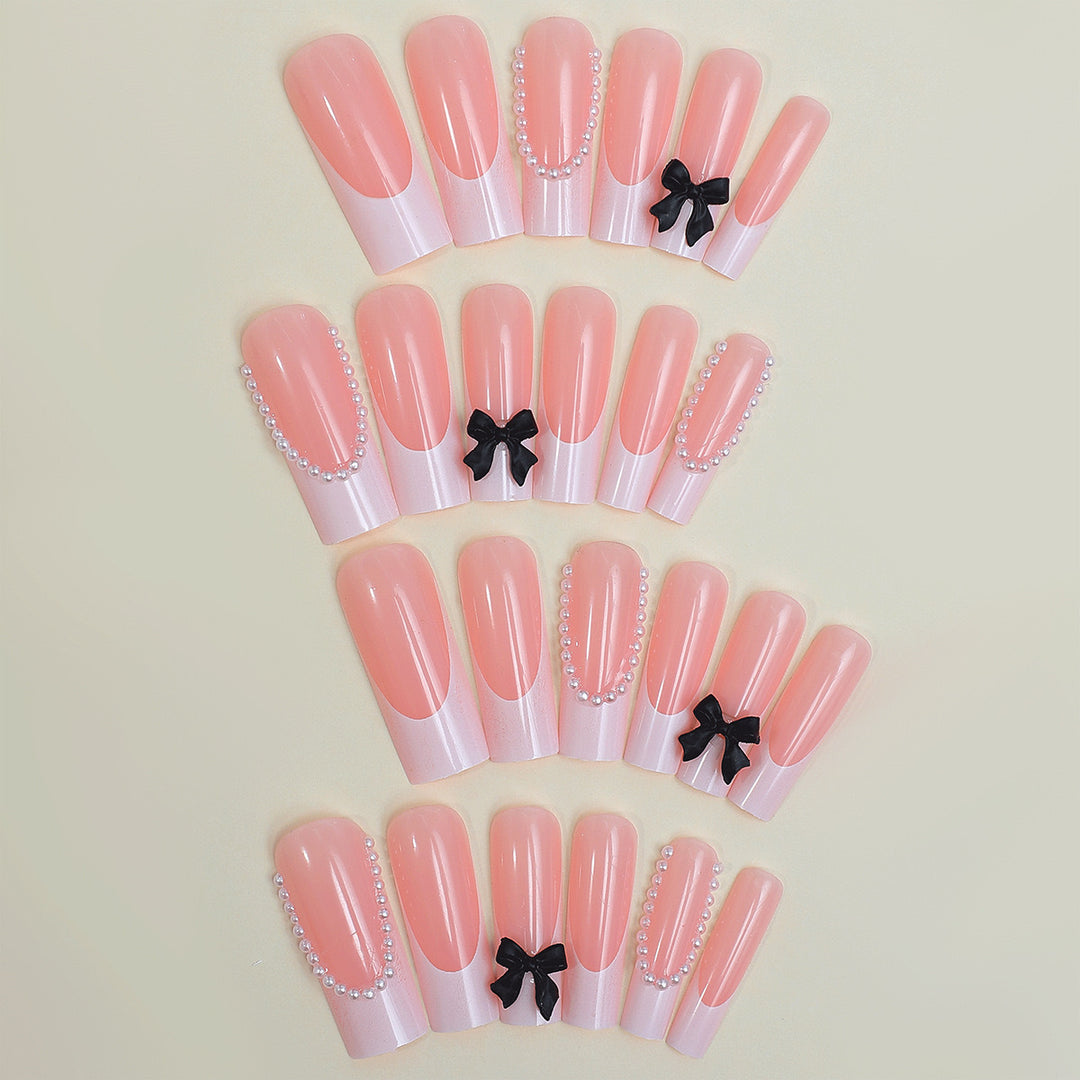 Artificial nail set with elegant rhinestone and bow decorations Bowlift