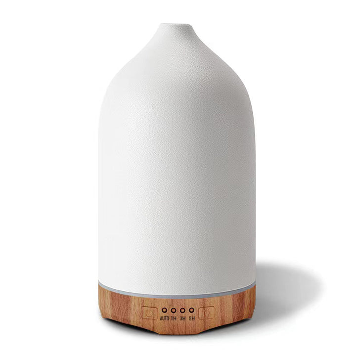 Ultrasonic essential oil diffuser with wood grain base and matte textured ceramic cover Bowlift