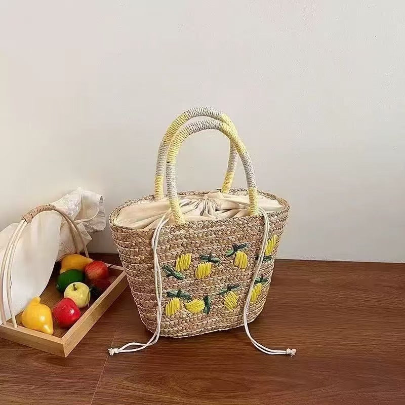 Spacious straw bag with lemon embroidery Bowlift