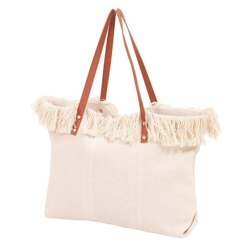 Beach bag with eye-catching fringe edge Bowlift