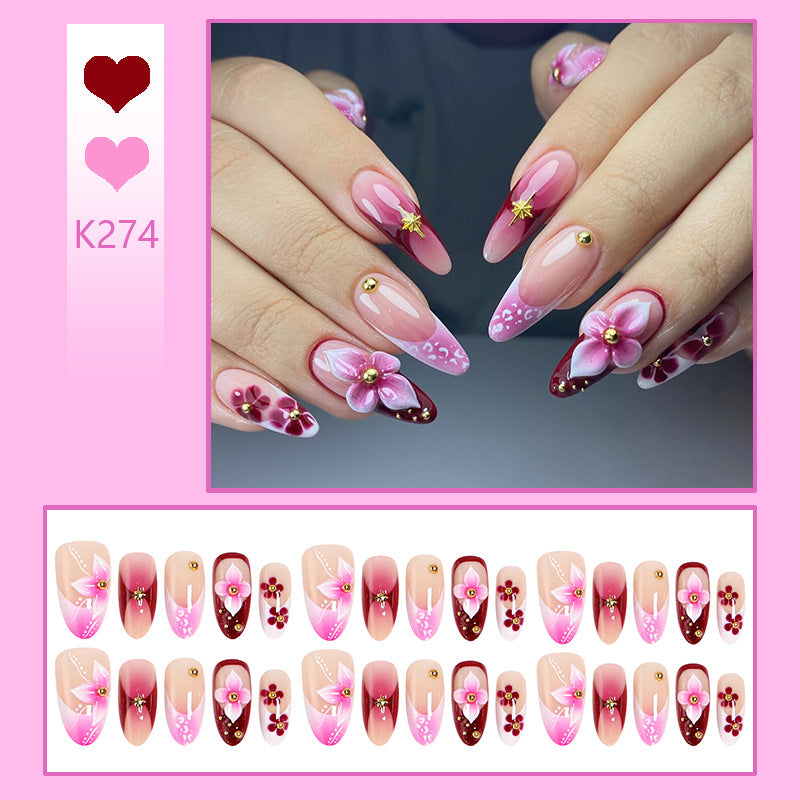 Artificial nails with floral designs and elegant details Bowlift