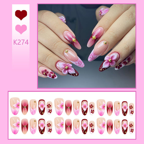 Artificial nails with floral designs and elegant details Bowlift