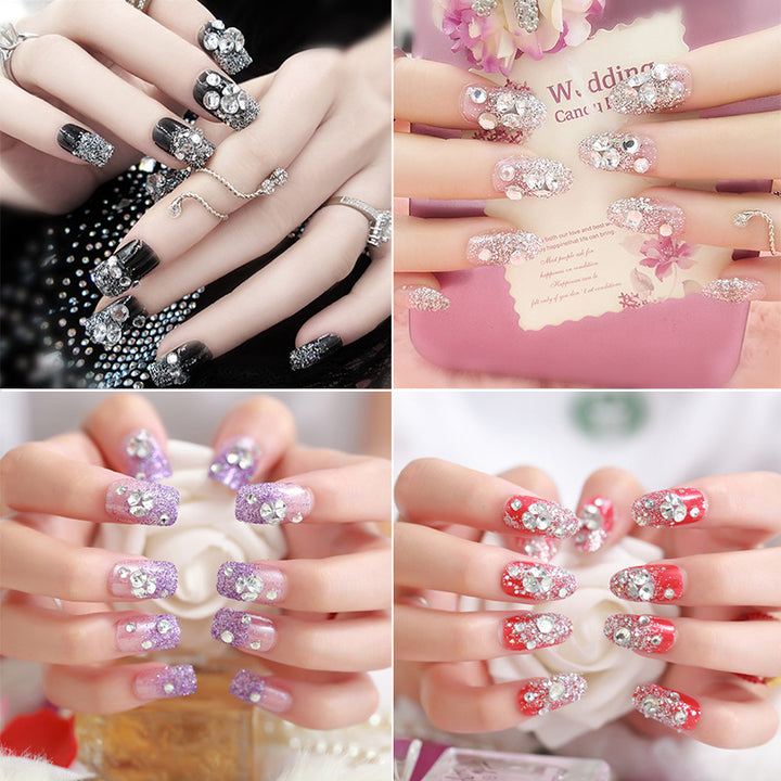 Artificials nails with sparkling rhinestone accents and elegant flower embellishments Bowlift