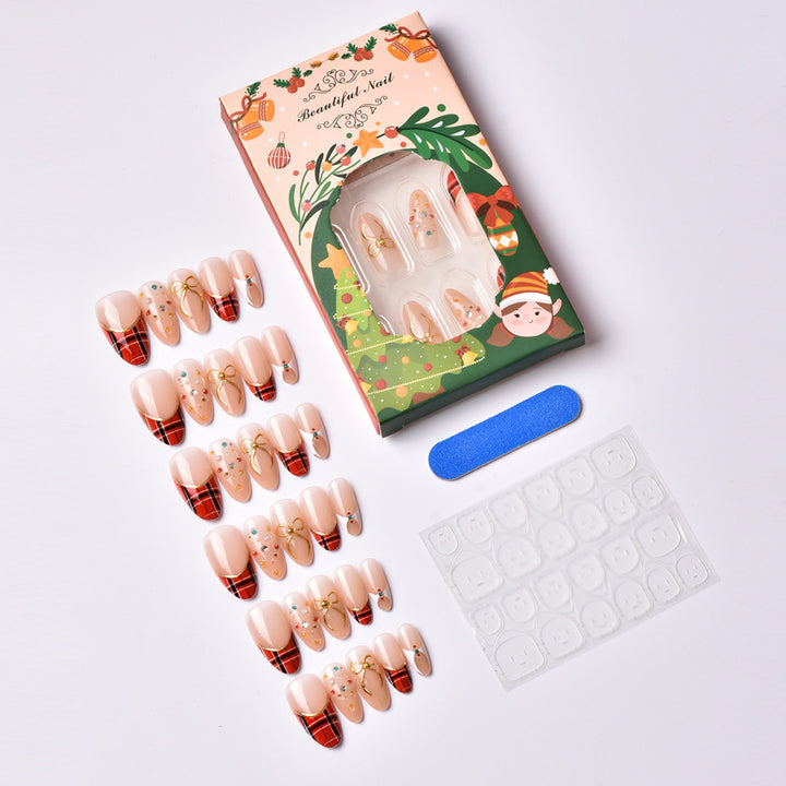 Artificial nail set with festive design and sparkling accents Bowlift