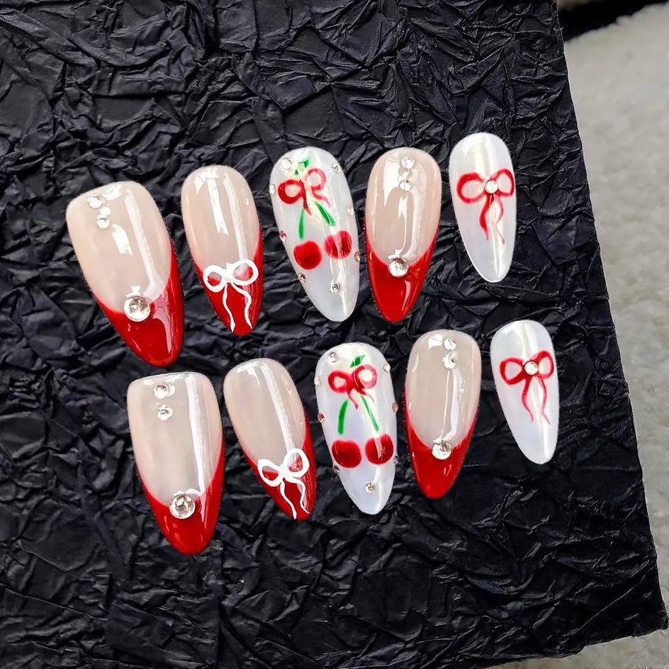 Artistic Press-On Nail Set with Cherry and Ribbon Design Bowlift