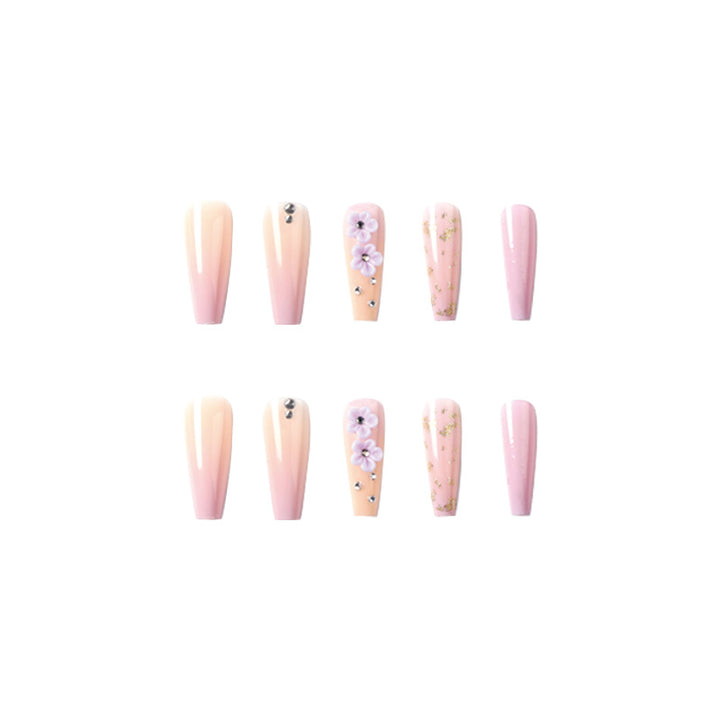 Artistic Gel Nails with Floral Design and Glitter Accents Bowlift