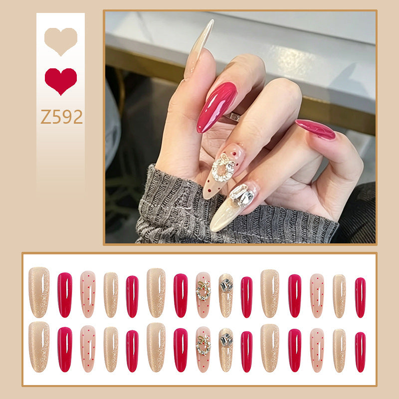 Artificial nail set with sparkling crystal accents and elegant color gradients Bowlift