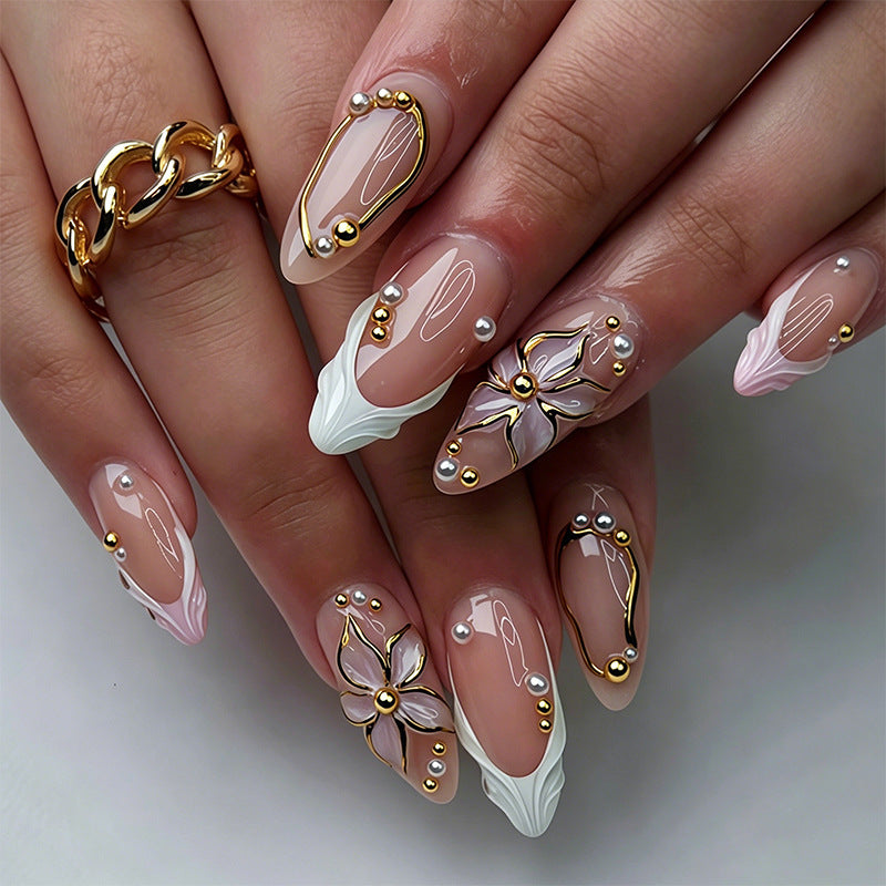 Artificial nail set with elegant floral designs and glamorous 3D applications Bowlift