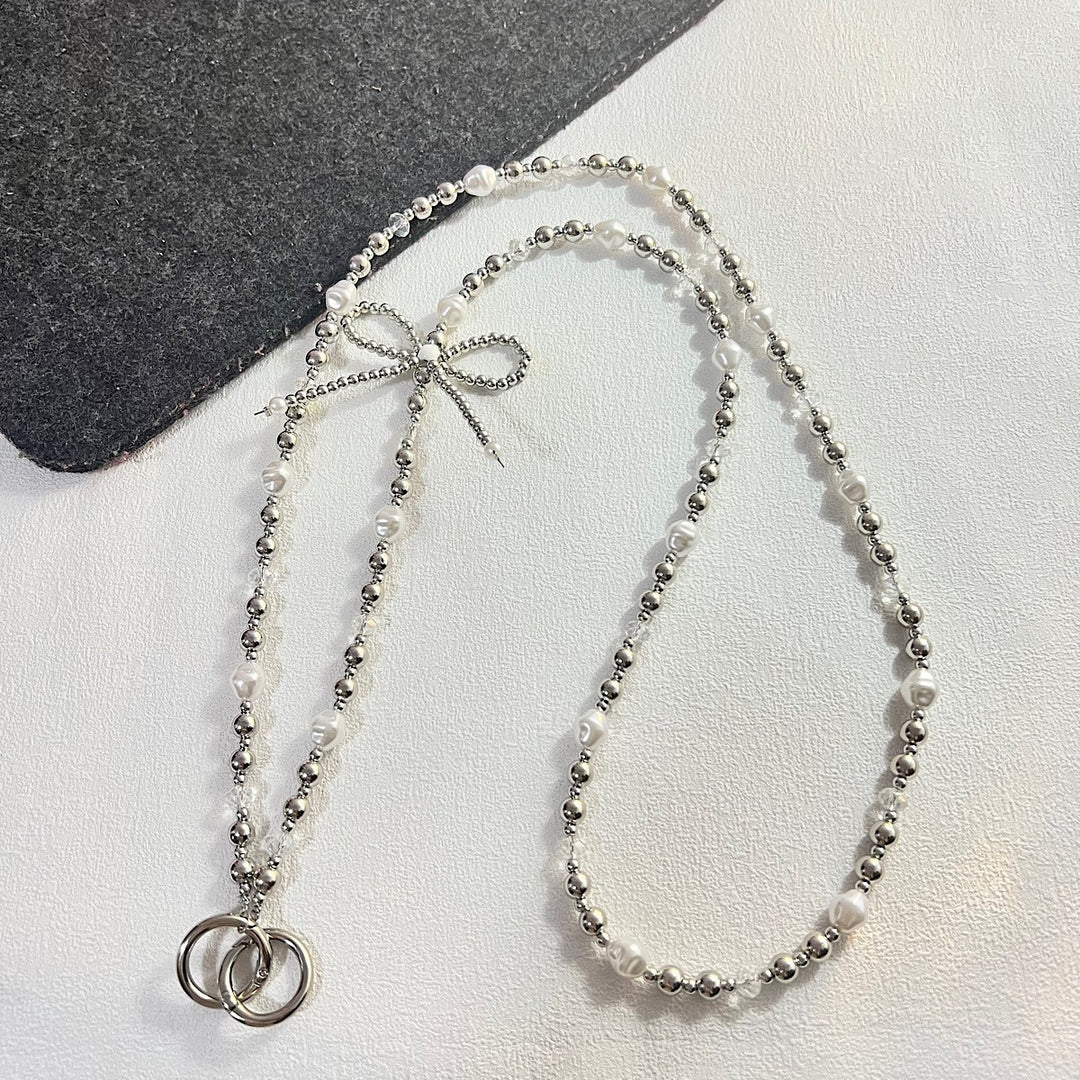 Elegant Pearl and Chain Necklace Bowlift