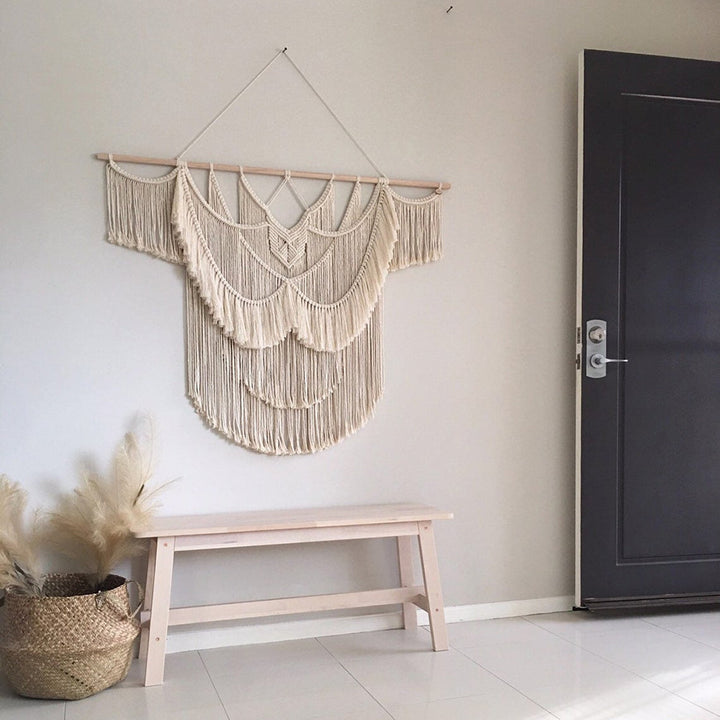 Elegant Macrame Wall Hanging with ornate fringes and leaves