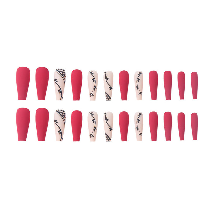 Artistic Long Press-On Nail Set with Floral Accents Bowlift