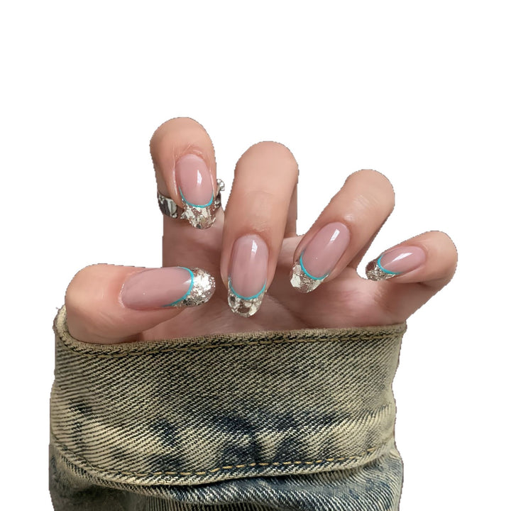 Artificial nails with shimmering glitter and elegant French-tip design Bowlift