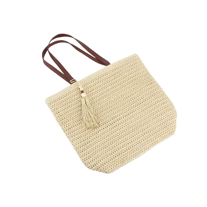 Spacious Shoulder Bag Made of Braided Natural Material with Decorative Tassel Bowlift