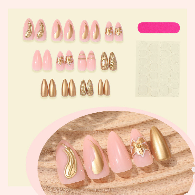 Creative nail art set with luxurious gold embellishments Bowlift
