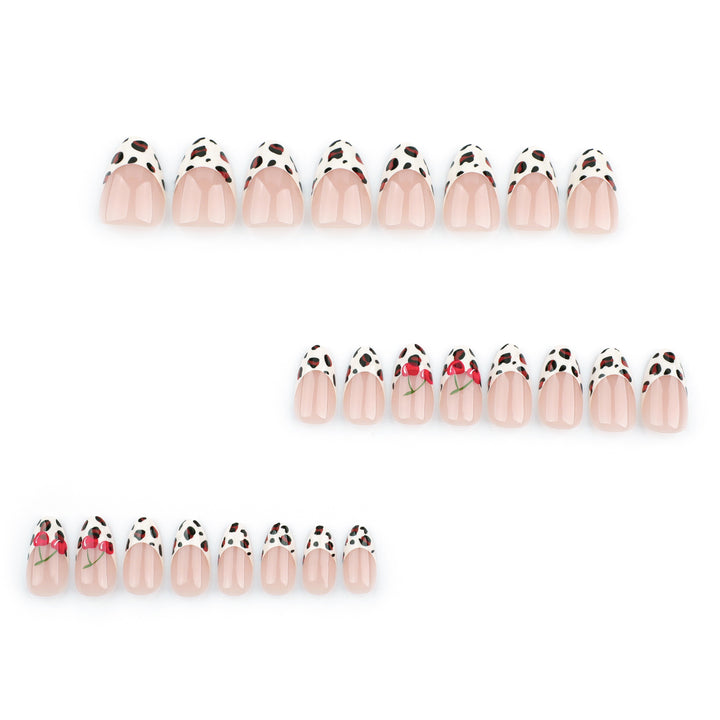 Artful animal pattern nails with cherry accents Bowlift