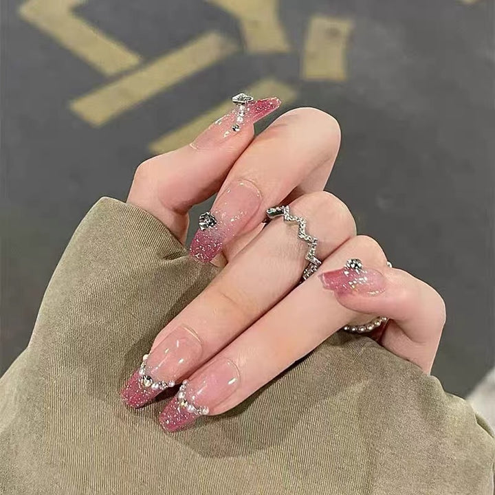 Glamorous artificial nails with sparkling accents Bowlift