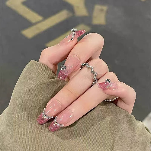 Glamorous artificial nails with sparkling accents Bowlift