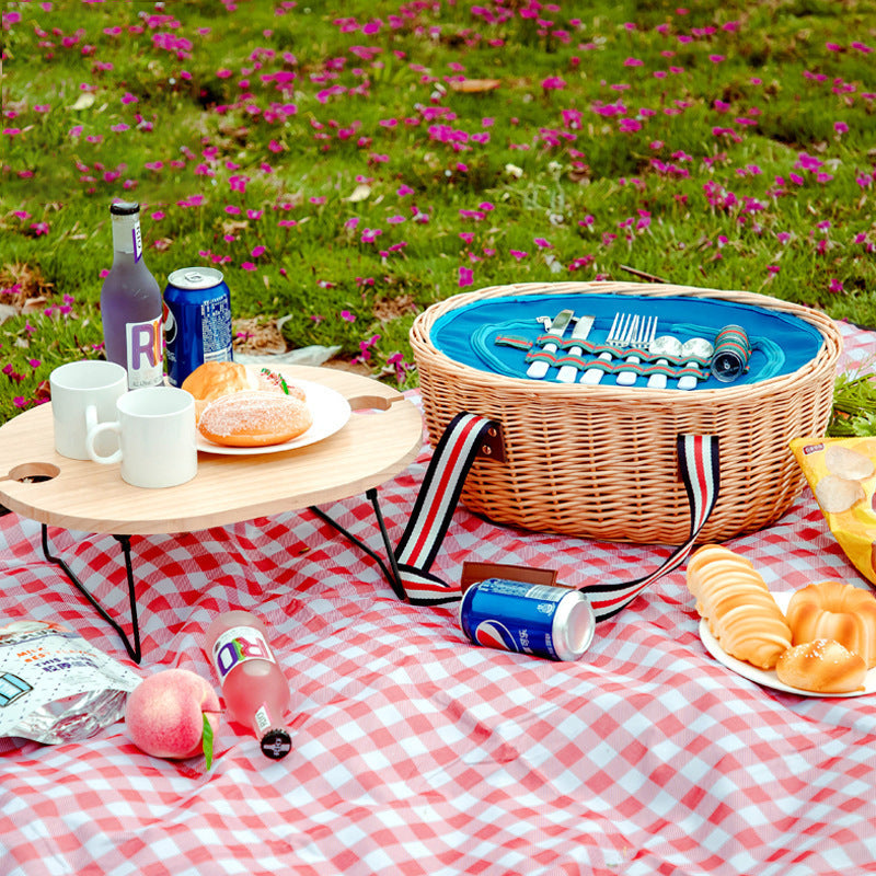 Exclusive basket with handles made of woven rattan Bowlift