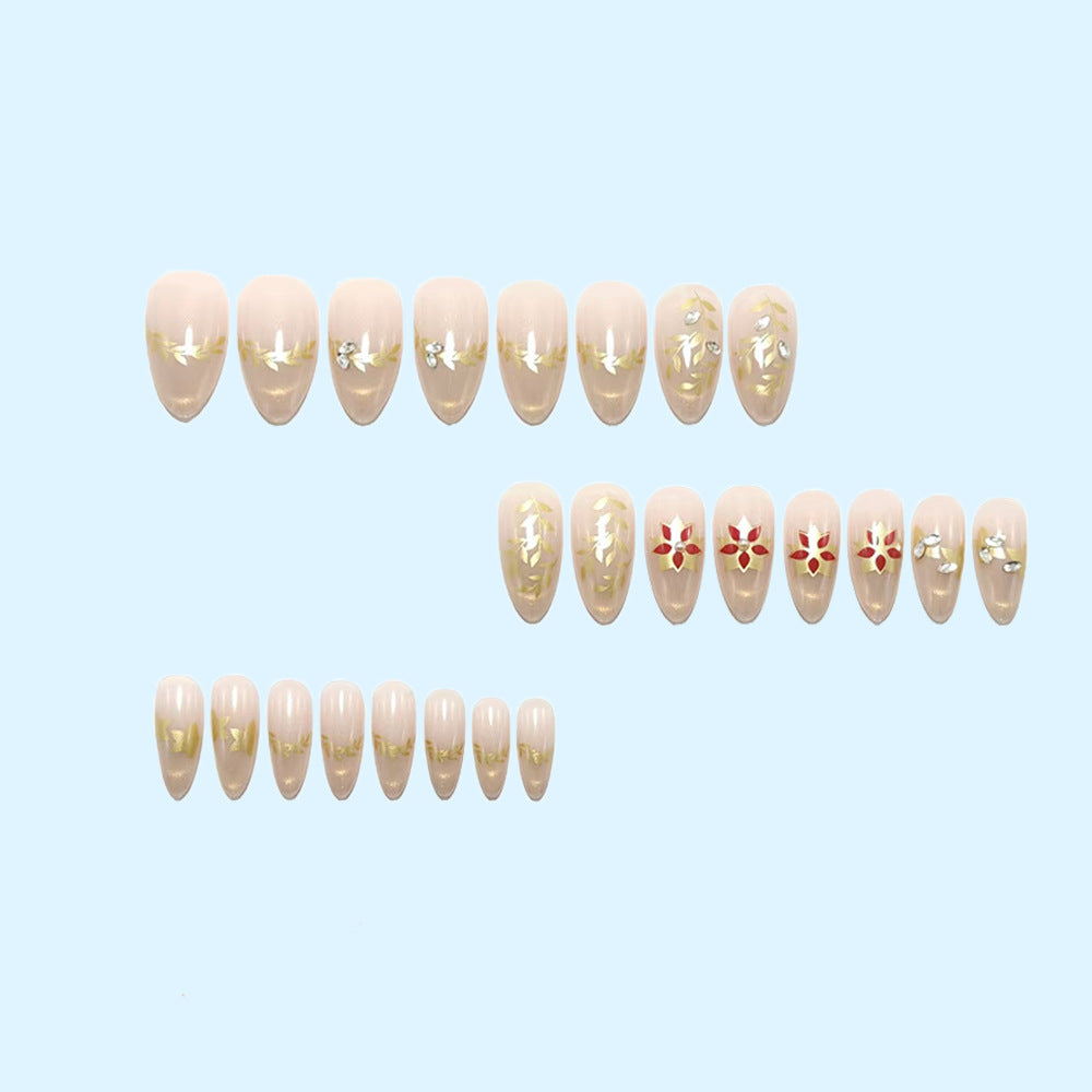 Artificial nails with elegant flower design and glitter accents Bowlift