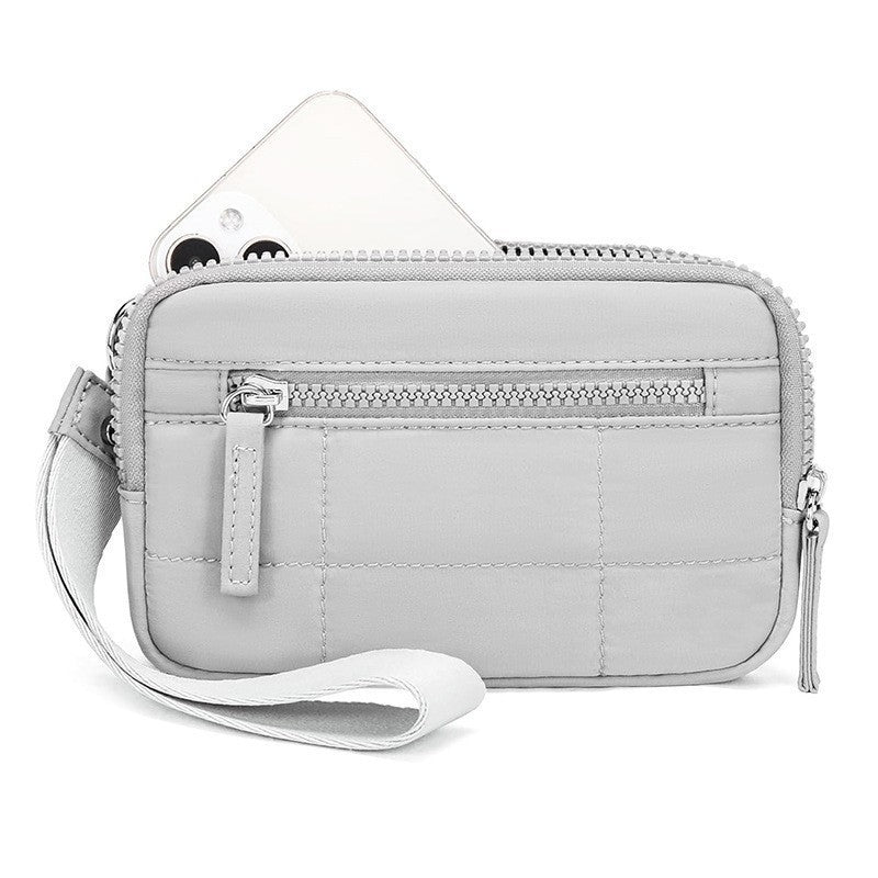 Practical wrist bag with zipper pockets Bowlift