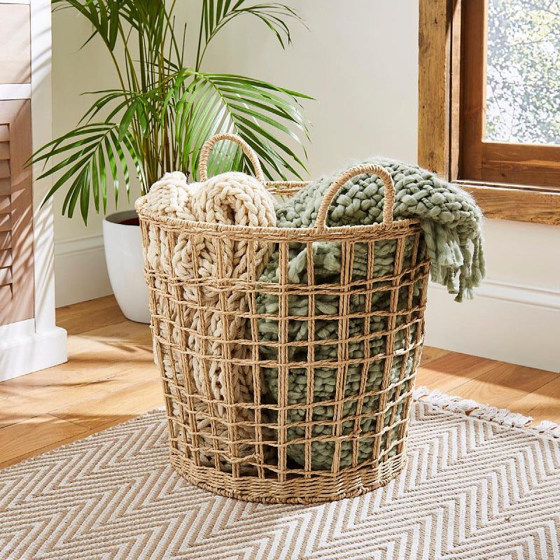 Stylish storage basket made of natural material Bowlift