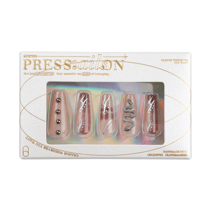 Artistic fingernails with snake and glitter accents Bowlift