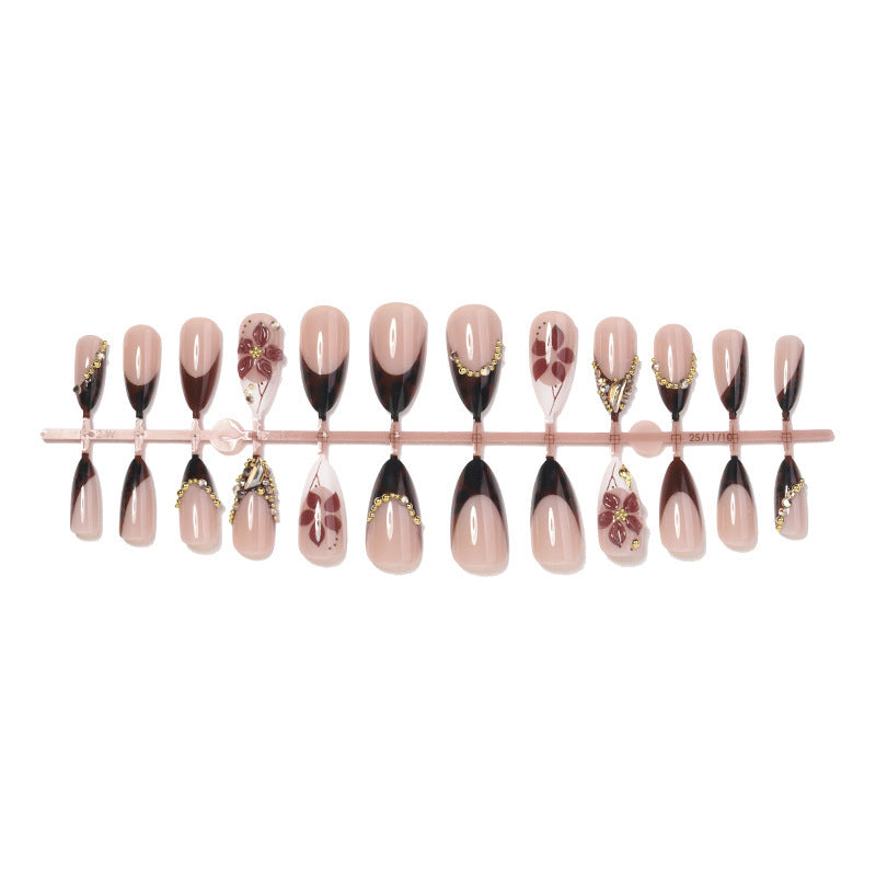 Acrylic nail set with elegant flower and glitter accent Bowlift