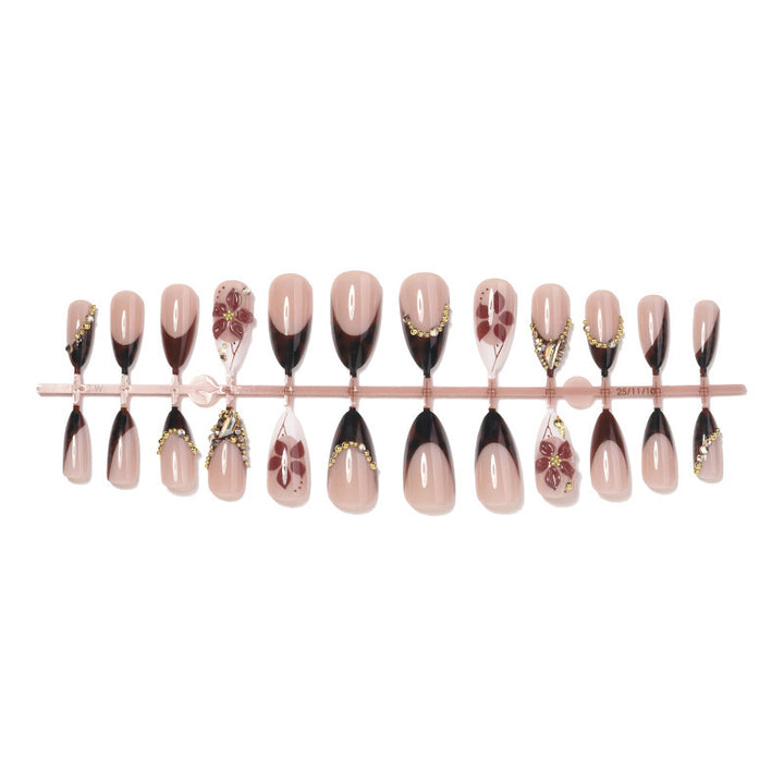 Acrylic nail set with elegant flower and glitter accent Bowlift