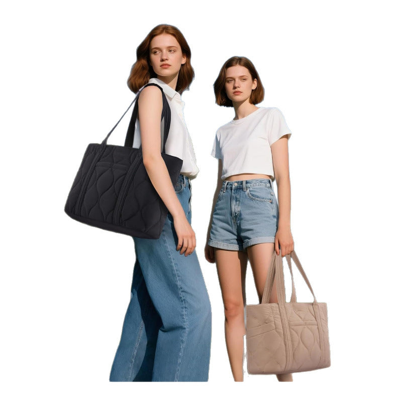 Quilted everyday bag with multiple outer pockets Bowlift