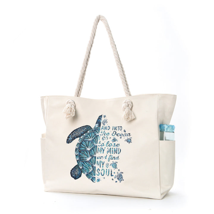 Beach bag with practical side pockets and robust design Bowlift