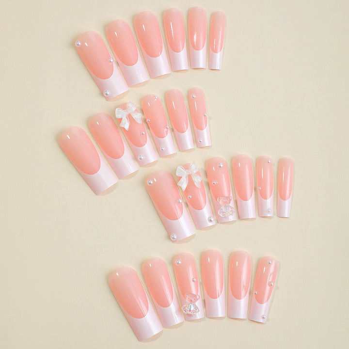 Artificial nail set with elegant 3D bows and glitter accents Bowlift
