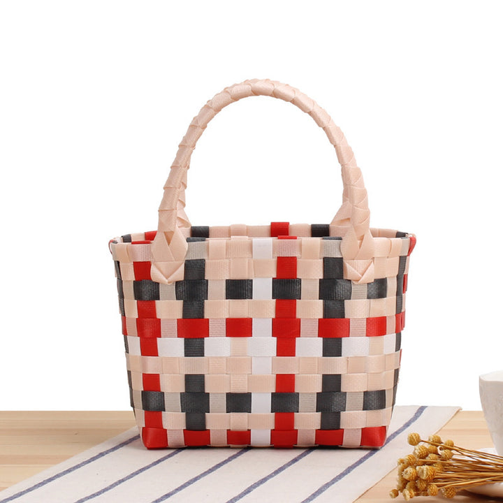 Handbag made of woven material with a stylish check pattern Bowlift