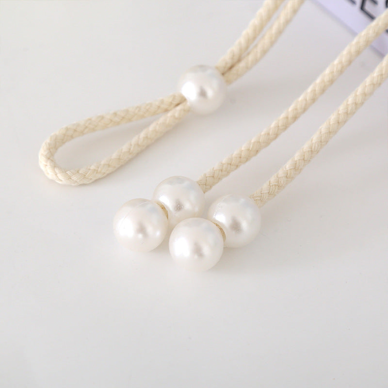 Elegant curtain tieback with pearl trim Bowlift