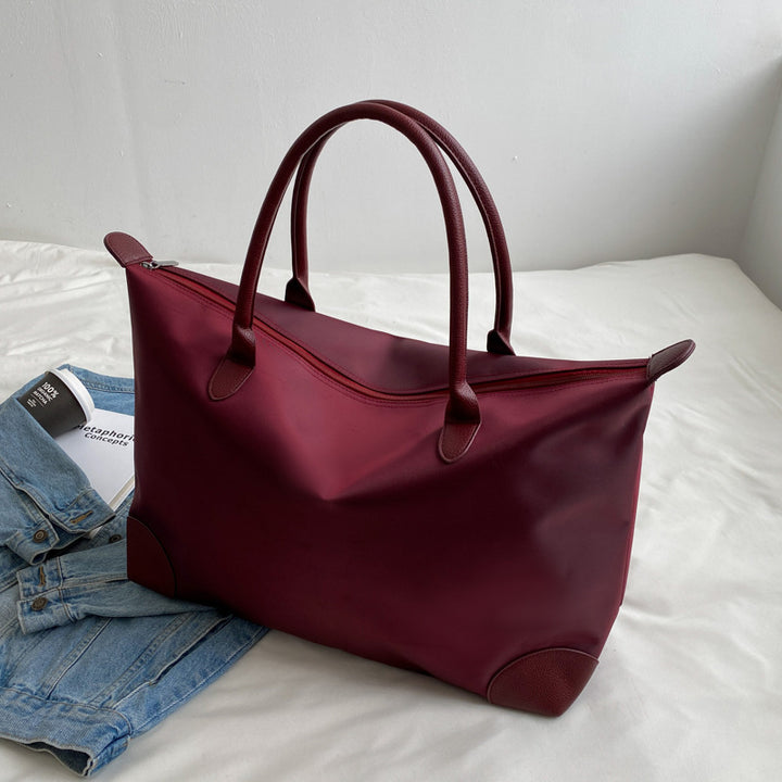 Large travel bag with durable material and multiple compartments Bowlift