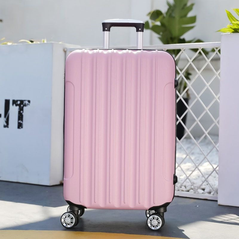 Hard shell suitcase with 360-degree wheel system and integrated safety feature Bowlift