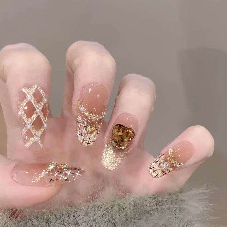 Artificial nails with glamorous rhinestone decorations Bowlift