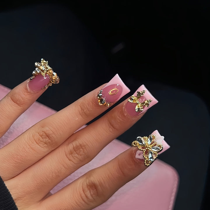 Artistic Nail Enhancements with Rhinestone Decorations Bowlift