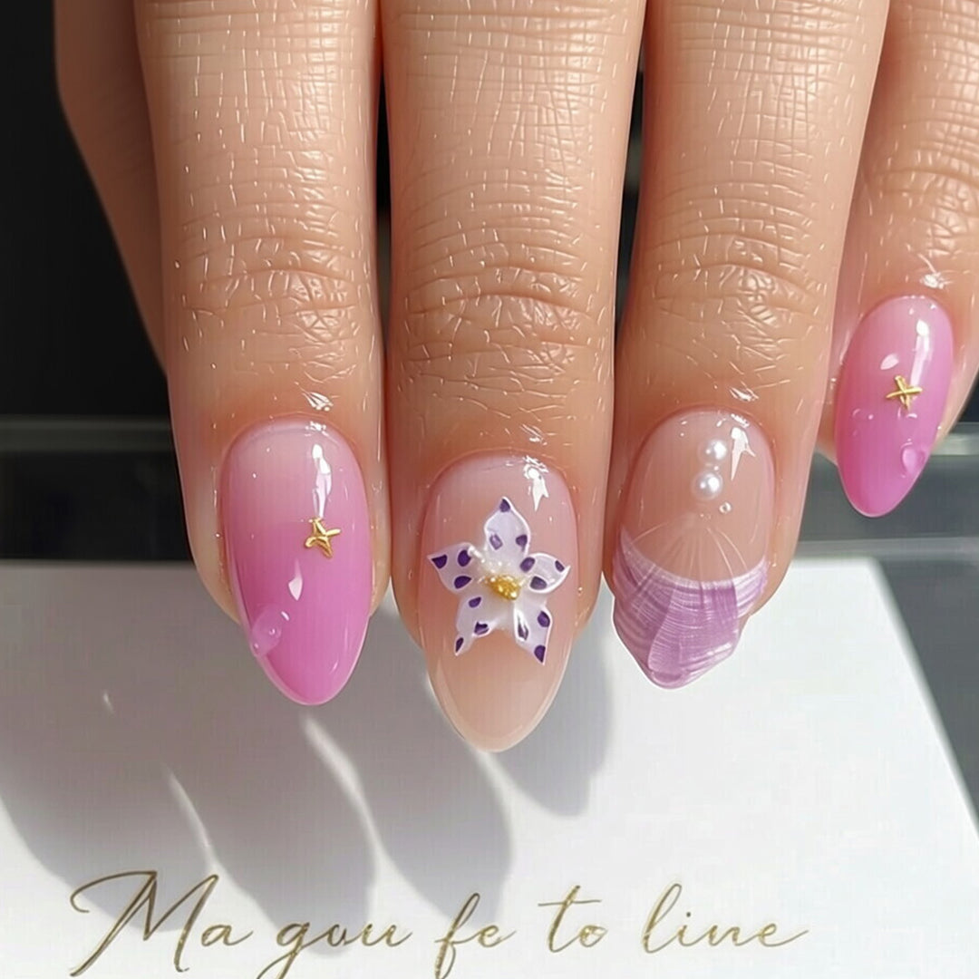 Artistic Press-On Nail Set with Star and Shell Accents Bowlift