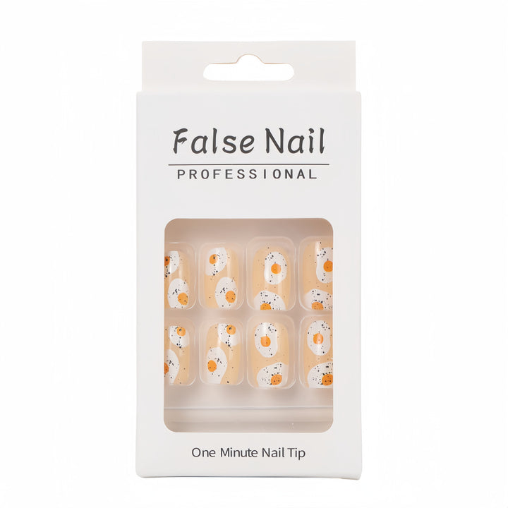 Artificial nails in creative fried egg design Bowlift